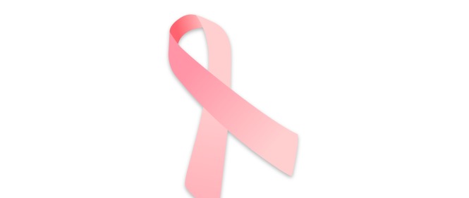 Zdjęcie przedstawiające różową wstążeczkę jako symbol profilaktyki raka piersi